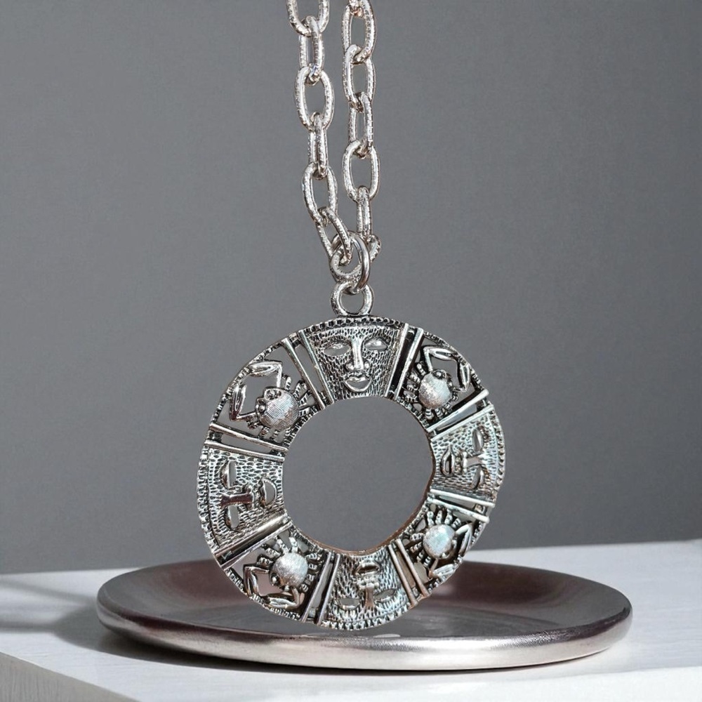 Sarah Coventry Talisman of Love, pendant w/ long chain and clip on earrings,1970